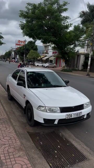 Mitsubishi Lancer Trắng. Mua bán Ô tô tại Thành phố Buôn Ma Thuột Đắk Lắk được đăng bởi Phú Nguyễn hình 1