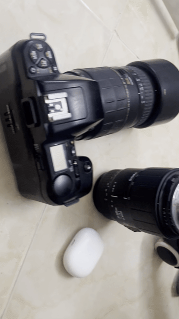Máy ảnh nikon F601 2 ống nhòm kèm tai Redmi để tủ. Mua bán Máy ảnh, Máy quay tại Quận Tân Phú Tp Hồ Chí Minh được đăng bởi Trương Hiệp hình 1