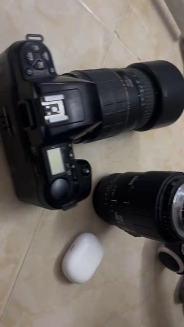 Máy ảnh nikon F601 2 ống nhòm kèm tai Redmi để tủ. Mua bán Máy ảnh, Máy quay tại Quận Tân Phú Tp Hồ Chí Minh được đăng bởi Trương Hiệp hình 1