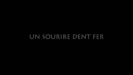 Sourire dent fer