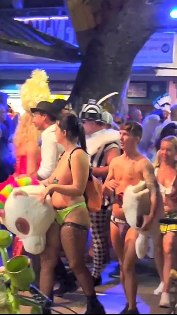 Buzz Lightyear-style costume, bikini-like coverage, full-body framing
