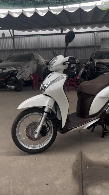 Honda SH Mode 2014 Trắng nâu bstp chính. chủ. Mua bán Xe máy tại Quận Bình Tân Tp Hồ Chí Minh được đăng bởi Hoàng Vinh hình 1