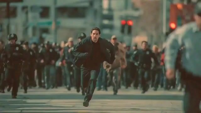 Man Fleeing Police in Urban Chase Scene