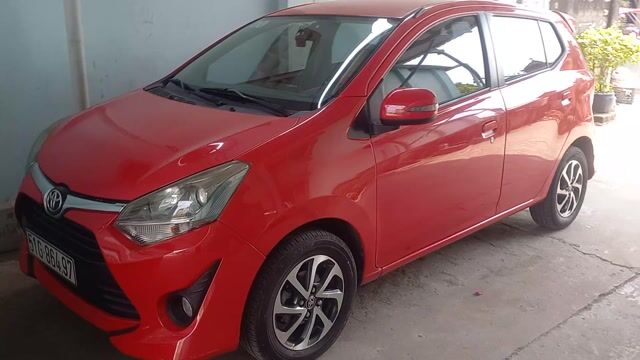 Toyota Agya màu Đỏ. Mua bán Ô tô tại Thành phố Dĩ An Bình Dương được đăng bởi Lê Học Car hình 1
