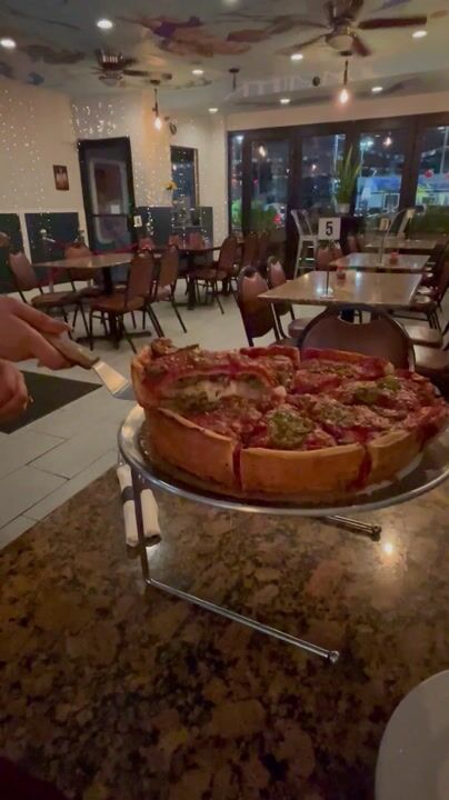 Check out Angelo’s stuffed pizza ! 
Best deep dish in Chicago ,IL

Look at this cheese pull!! 🍕🍕🍕