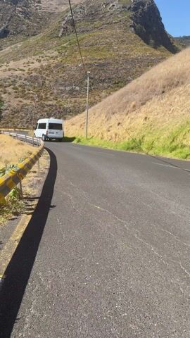The steep road down to Praia da Ribeira do Natal