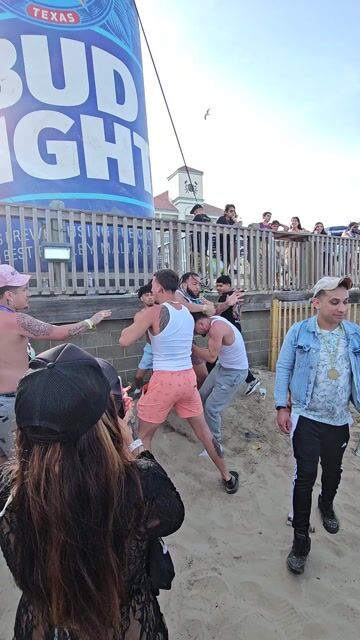 Beach fight, everyone clothed
