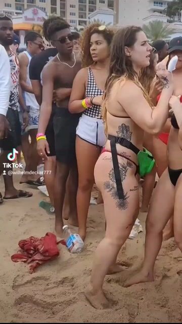 Beach crowd in normal swimwear