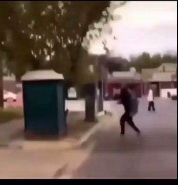 Guy Pushes Over Porta Potty With Girl Inside