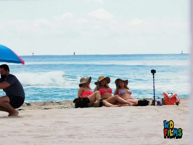 Bikinis in normal beach context, wide shots