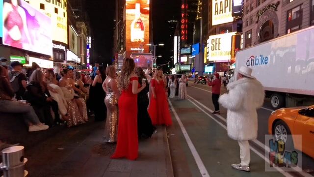 Times Square crowds, fully clothed