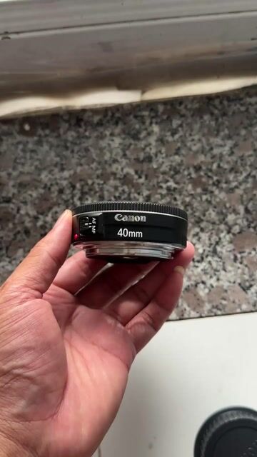 Ống kính Canon 40mm STM Đen. Mua bán Máy ảnh, Máy quay tại Thành phố Thuận An Bình Dương được đăng bởi Quang kỳ hình 1