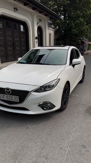 Mazda 3 Hatback 2016 Trắng 87000 km. Mua bán Ô tô tại Quận 12 Tp Hồ Chí Minh được đăng bởi F2Auto hình 1