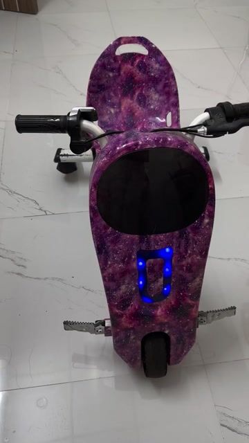 Xe điện 3 bánh màu Tím cho bé. Mua bán Mẹ và bé tại Thị xã Phú Mỹ Bà Rịa - Vũng Tàu được đăng bởi Yumi Diệp Vy hình 1