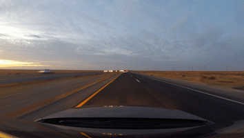 Animated gif example of car driving down highway