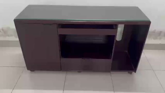 Kệ tivi Gỗ Kính Nâu Có bánh xe. Mua bán Tủ, kệ gia đình tại Quận Hà Đông Hà Nội được đăng bởi LAN ANH hình 1