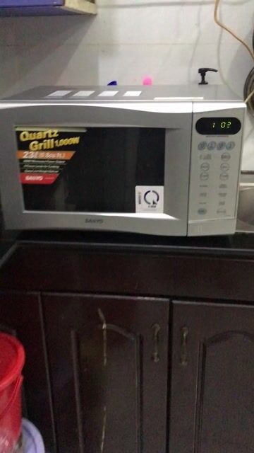 Lò vi sóng Sanyo EM-G4757S 23L. Mua bán Bếp, lò, đồ điện nhà bếp tại Quận 11 Tp Hồ Chí Minh được đăng bởi Cherry hình 1