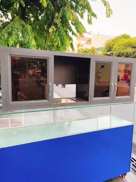 Tủ bếp treo tường Nhôm Kính xám khói. Mua bán Tủ, kệ gia đình tại Quận 12 Tp Hồ Chí Minh được đăng bởi Dương Ngọc Bích hình 1