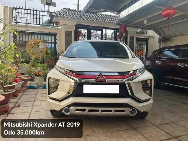 Mitsubishi Xpander 2019 Trắng 35000km. Mua bán Ô tô tại Thành phố Thủ Đức Tp Hồ Chí Minh được đăng bởi Loan Nguyễn hình 1