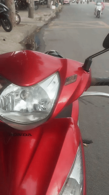 Honda Vision màu Đỏ. Mua bán Xe máy tại Quận Liên Chiểu Đà Nẵng được đăng bởi Luong Tin hình 1