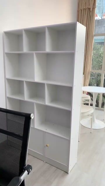 Kệ sách lưng kín loại rộng 1m mầu trắng ván dày 12. Mua bán Tủ, kệ gia đình tại Quận Tây Hồ Hà Nội được đăng bởi MAI TRANG STORE hình 1