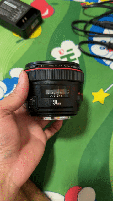 Ống kính Canon 50L f1.2 Đen f/1.2. Mua bán Máy ảnh, Máy quay tại Thành phố Thuận An Bình Dương được đăng bởi Quang kỳ hình 1