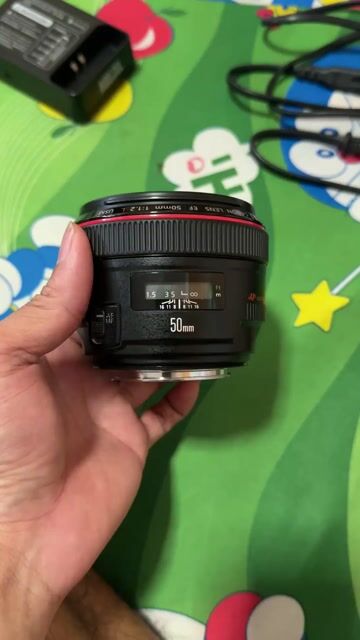 Ống kính Canon 50L f1.2 Đen f/1.2. Mua bán Máy ảnh, Máy quay tại Thành phố Thuận An Bình Dương được đăng bởi Quang kỳ hình 1