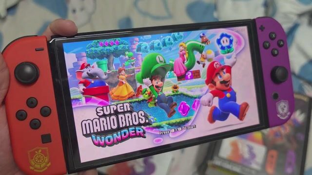 Nintendo Switch OLED Pokemon Violet 256GB. Mua bán Thiết bị chơi game tại Thành phố Vị Thanh Hậu Giang được đăng bởi Anh Duy hình 1