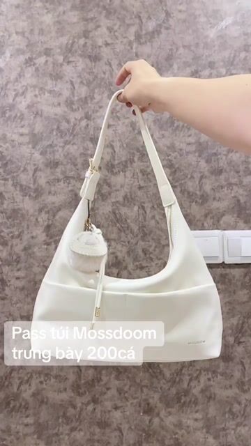 Túi xách Mossdoom Nữ Trắng Mới. Mua bán Túi xách tại Thành phố Thủ Đức Tp Hồ Chí Minh được đăng bởi SANG VIỆT hình 1
