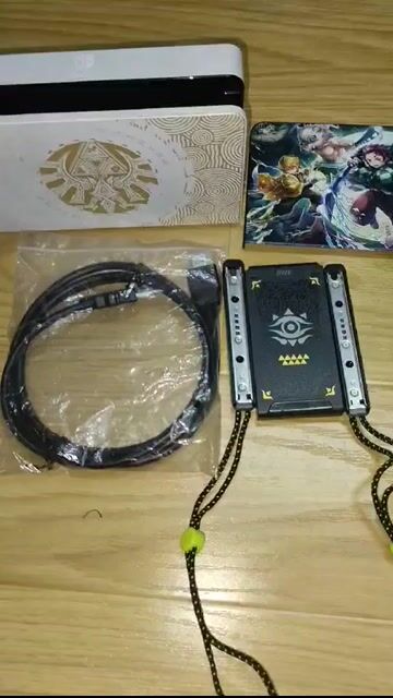 Nintendo OLED Zelda Dock sạc, Dây đeo, Grip. Mua bán Phụ kiện (Màn hình, Chuột...) tại Quận 4 Tp Hồ Chí Minh được đăng bởi Diệp Văn Đạt hình 1