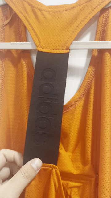 Áo ba lỗ Adidas Cam Polyester d62/n40. Mua bán Quần áo tại Quận Bắc Từ Liêm Hà Nội được đăng bởi vivuthrift hình 1