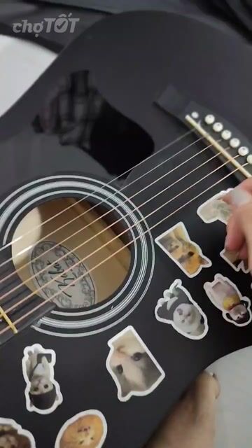 Đàn guitar Gỗ Đen. Mua bán Nhạc cụ tại Thành phố Tân An Long An được đăng bởi Dương Phúc Thiện hình 1
