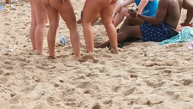 Beach party, swimwear in normal beach context