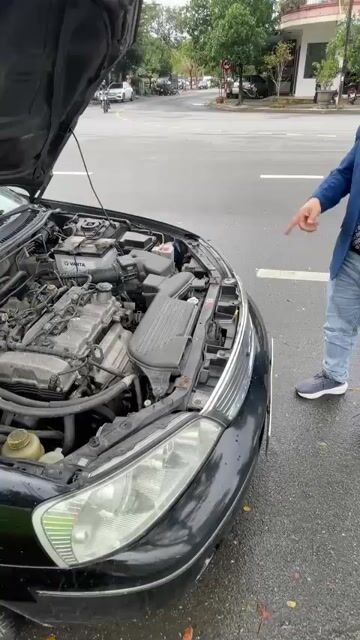 Ford Laser GhiA 2005 Đen 130000 km. Mua bán Ô tô tại Quận Hải Châu Đà Nẵng được đăng bởi Huong Son hình 1