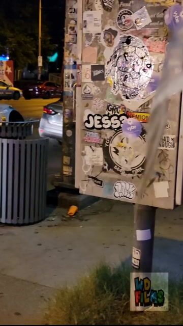 Fully clothed woman on night street