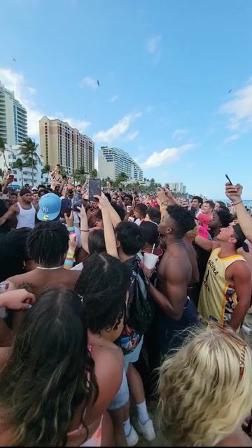 Beach boxing crowd in swimwear