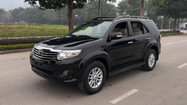 Toyota Fortuner 2014 2.7V 4x4 Đen 150.000 km. Mua bán Ô tô tại Quận Cầu Giấy Hà Nội được đăng bởi Vũ Kiên hình 1