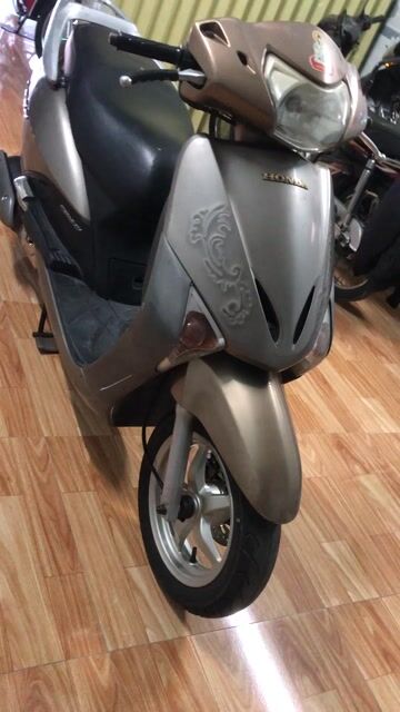 Honda Lead Fi 2012 Vàng - đen 3D. Mua bán Xe máy tại Huyện Hóc Môn Tp Hồ Chí Minh được đăng bởi Ngôi nhà hạnh phúc hình 1