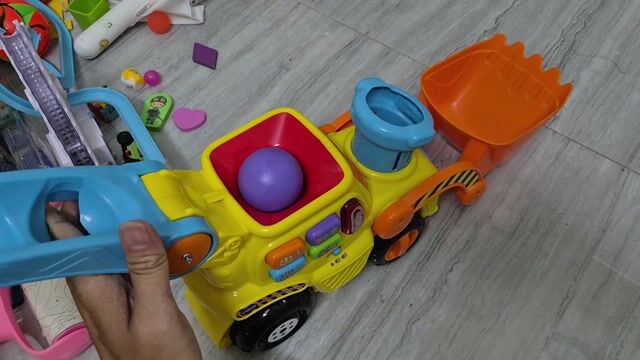 Xe đồ chơi Máy xúc Mỹ nhạc đèn còi. Mua bán Mẹ và bé tại Huyện Nhà Bè Tp Hồ Chí Minh được đăng bởi sang hình 1